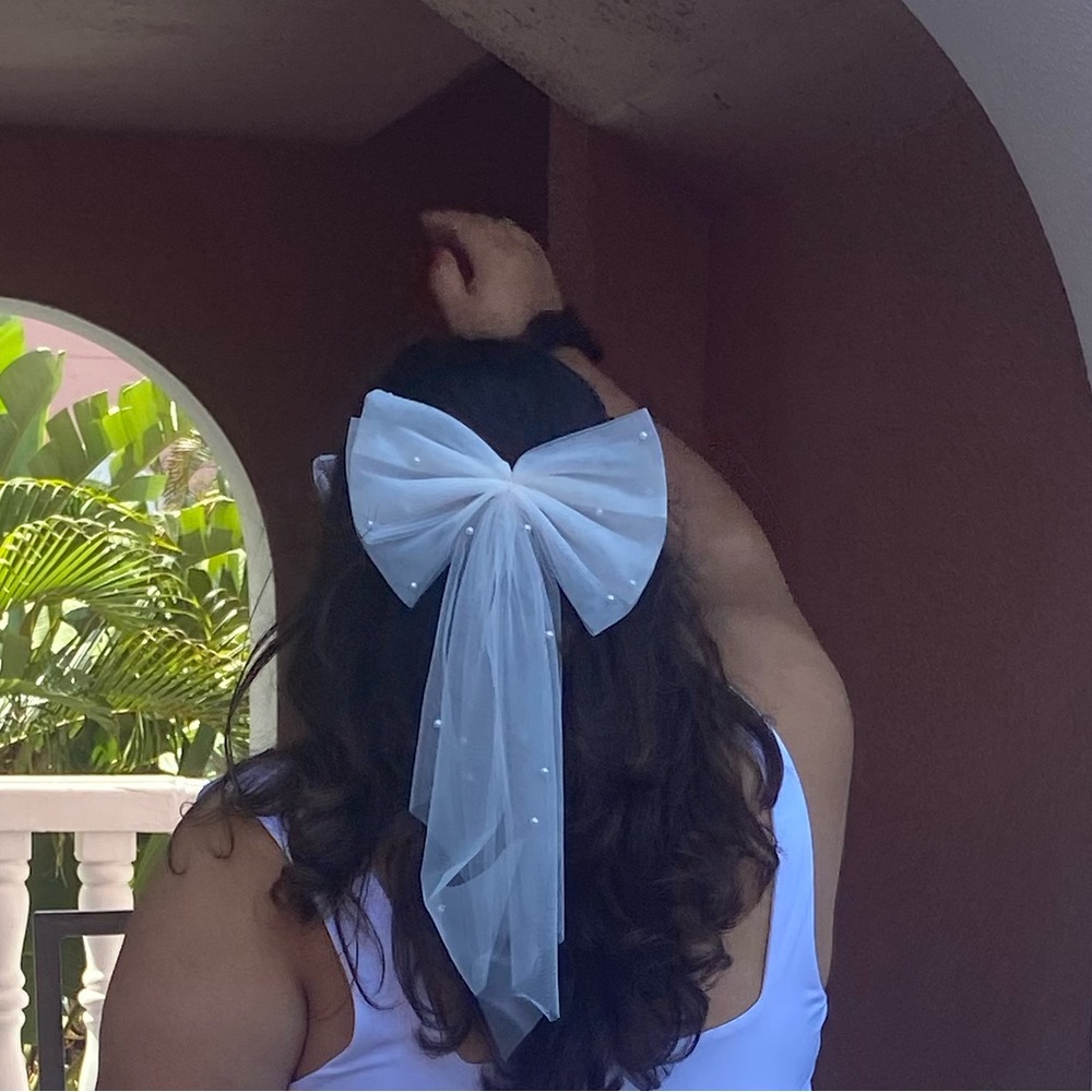 Pearl and tulle clip on bow for brides